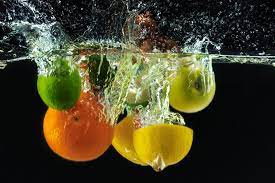 antioxidant deluxe fruit in water with water splashing