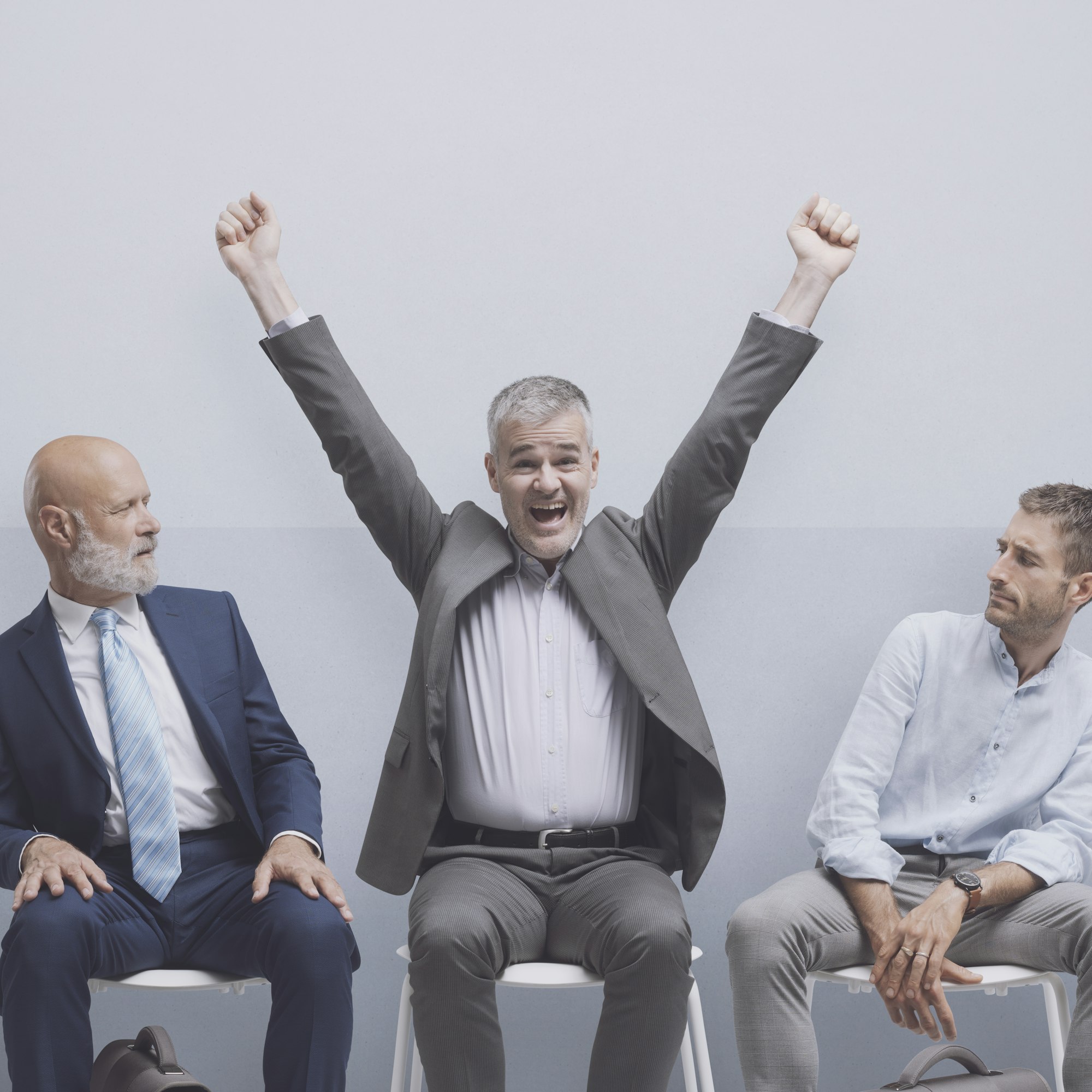 Happy man hired after the job interview